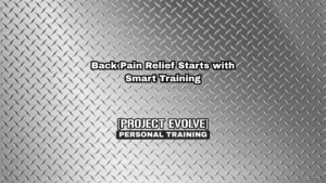 personal trainer near me helping with back pain in gym naples fl