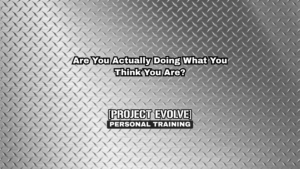 Personal trainer in Naples FL coaching adult client on strength accountability