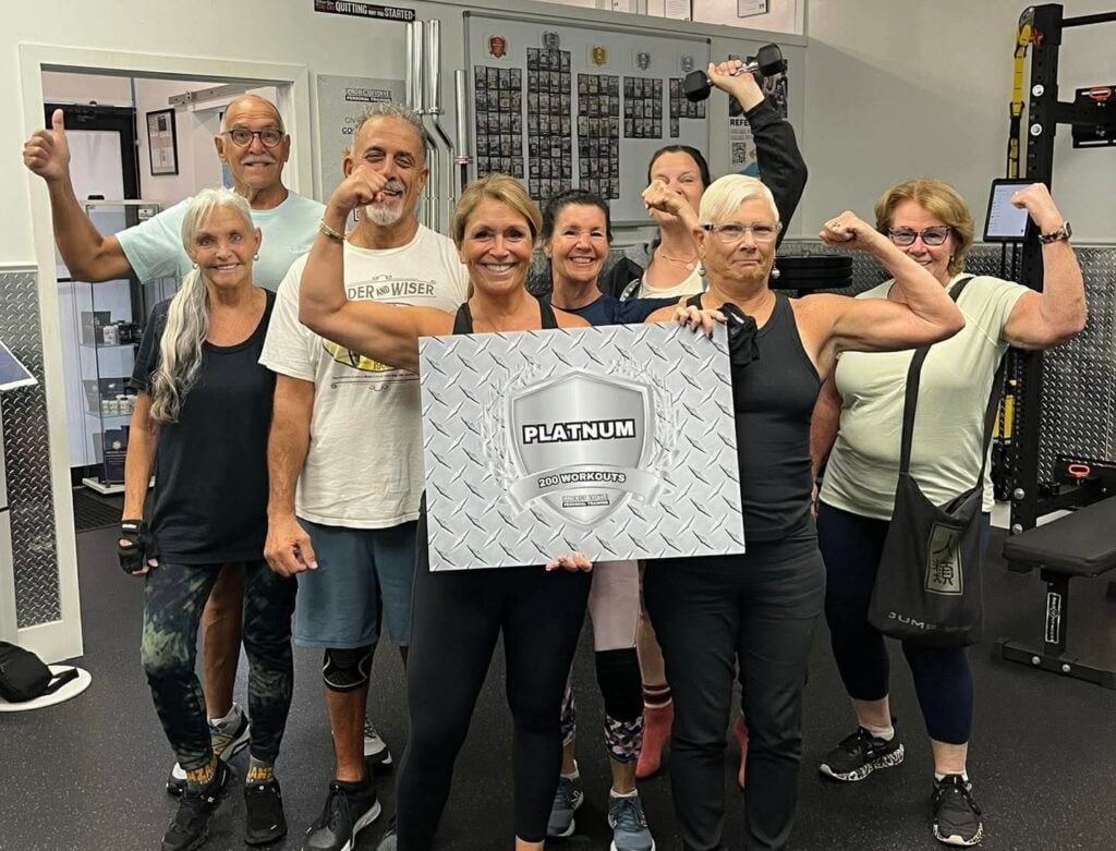Personal trainer Naples FL coaching men and women in a small group session